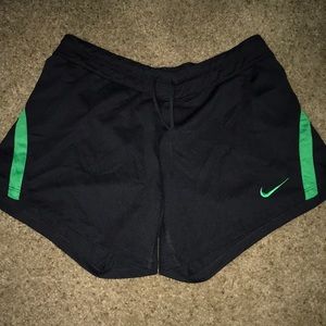 Black and green mike shorts